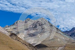 Grey mountain peaks at Valle de Colina, CajÃÂ³n del Maipo at San Miguel in Chile,  a popular tourist destination photo