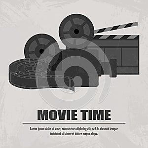 Grey movie clapboard, projector with movi strip at light background photo
