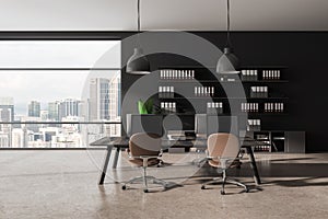 Grey office coworking interior with pc computer on desk, shelf and window