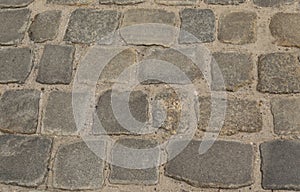 Grey Old Stone Pavement Top View or Granite Cobblestone Road