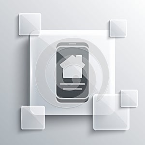 Grey Online real estate house on smartphone icon isolated on grey background. Home loan concept, rent, buy, buying a