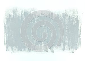 Grey paint brushstrokes on white wall background