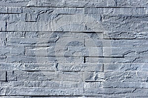 Grey pattern of decorative brown grey slate stone wall