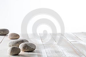 Grey pebbles for meditation, mindfulness, mineral spa or white emptiness