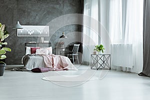 Grey and pink bedroom interior