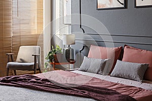 Grey and pink bedroom interior