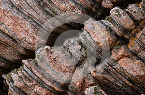 Grey and pink gneiss metamorphic rock..