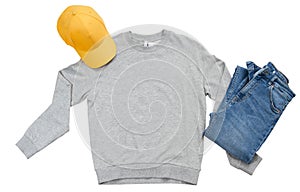 Grey pullover mock up isolation, yellow summer cap and blue denim - mockup isolation over white. Copy space