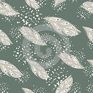 Grey random geometric leaf shapes seamless pattern in doodle style. Pale green background with splashes