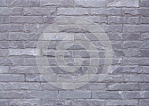 Grey sandstone wall background and texture