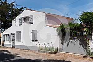 Grey shutter house in VendÃ©e on the island of Noirmoutier in France