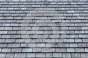 Grey slate roof tiles background image