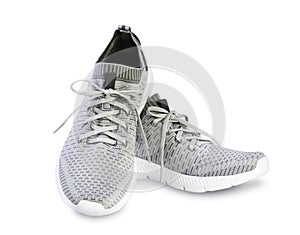 Grey sport male pair shoes isolated. photo