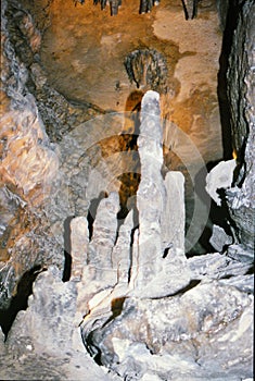 Grey stalagmites formed by mineral deposits and dripping water