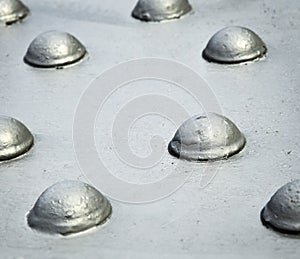 Grey steel rivets