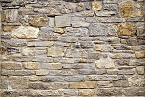 Grey stone wall background. Surface stone wall background.