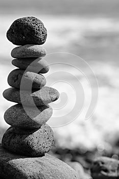 Grey stones or pebbles stacked in pyramid