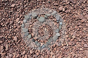 Heart Shaped Grey Rocks over Rose Colored Stones