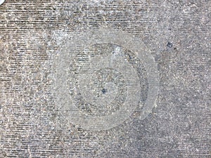 Grey textured concrete wall with rough surface