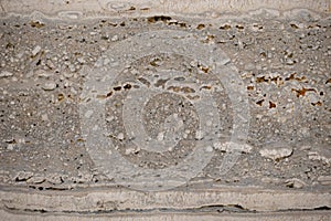 A Grey Textured Marble Slab with Natural Holes