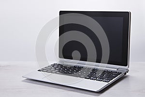 Grey toned image of an blank laptop screen