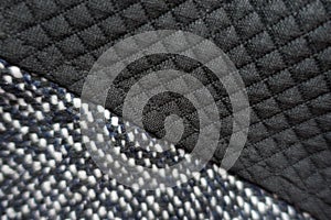 Grey tweed and black polyester sewn together