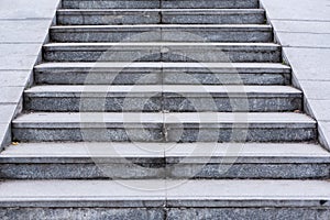 Grey urban stairs of a pedestrian bridge