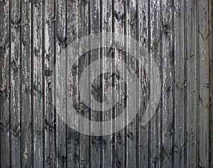 Grey vintage seamless wooden old planks background. Weathered cracked wall with peeling paint, abstract background