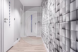 Grey wall in hallway