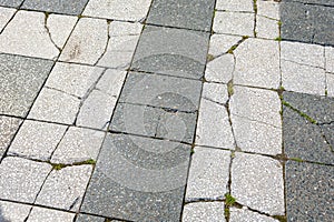 Grey and white broken pathway stone slabs