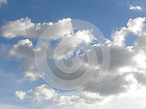 Grey and white clouds in blue sky