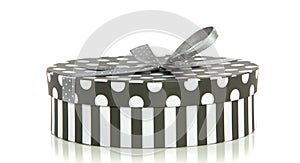 A grey white striped dotted giftbox