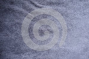 Greyish blue artificial suede fabric surface from above