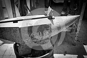 Greyscale image of an old anvil photo