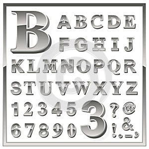 Greyscale metallic numerals and alphabet letters photo