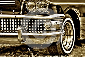 Greyscale shot of the Buick Century Riviera 1958 with Tail Fin