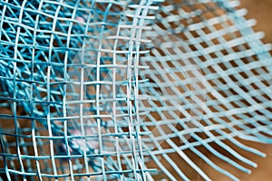 Grid of grids in selective focus on a brown background