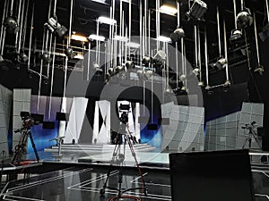 The grid of lights and camcorders in a television studio