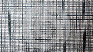 grid-like texture of the inside of an envelope