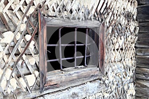 Grid on the window of an abandoned Soviet prison in the winter i