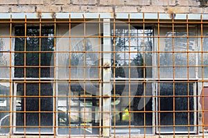 Gridded windows of an abandoned factory