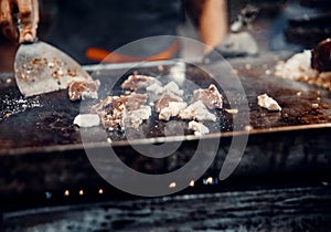 Griddle shovel making street food in the market of the Medina of Beni Mellal-Jenifra this city of Morocco is located between the