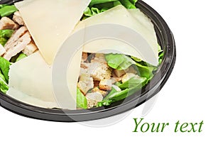 Griddled chicken caesar salad covered with cheese