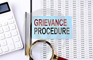 GRIEVANCE PROCEDURE text on sticker on the chart background, business concept