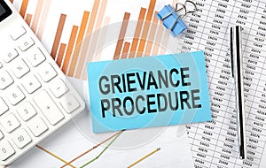 GRIEVANCE PROCEDURE text on the sticker on diagram background
