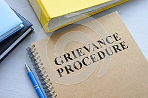 Grievance procedure and yellow folder. photo