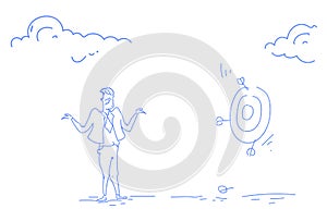 Grieved businessman miss unsuccessful shot target goal business failure concept confused man sketch doodle horizontal photo