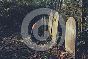 Grieving woman by grave