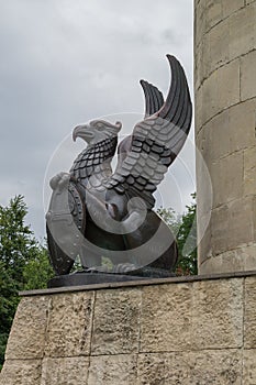 Griffin left of the pedestal of the monument to Ilya Muromets in Murom photo