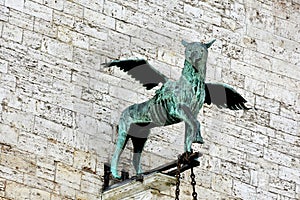 Griffin, mythical creature at Palazzo dei Priori in Perugia, Umbria